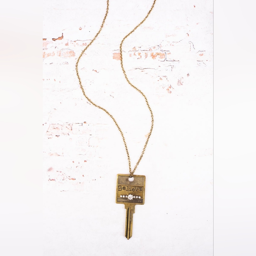 BURNISHED BRASSTONE AND CRYSTAL 'BELIEVE' KEY NECKLACE